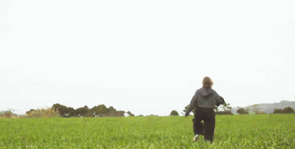 running uneasily through the field